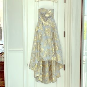 Strapless gown by Cachet.